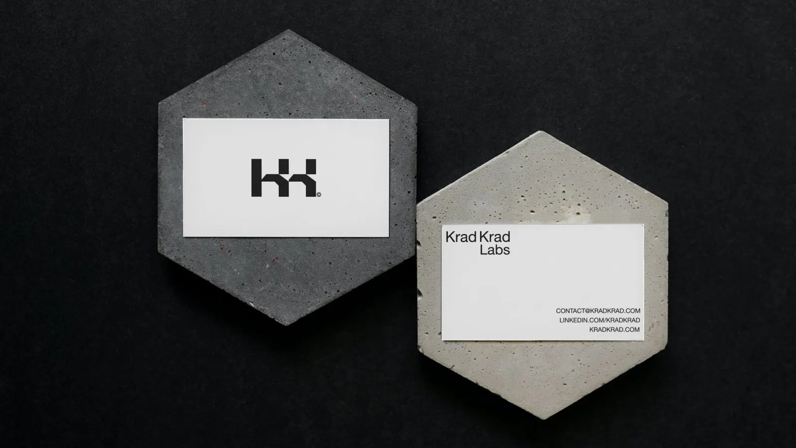 Krad Krad Labs cards on hexagonal concrete coasters