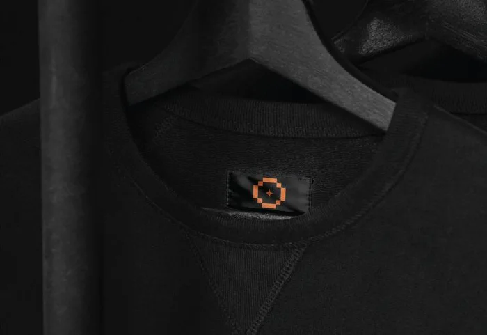 Small emblem label on a black jacket