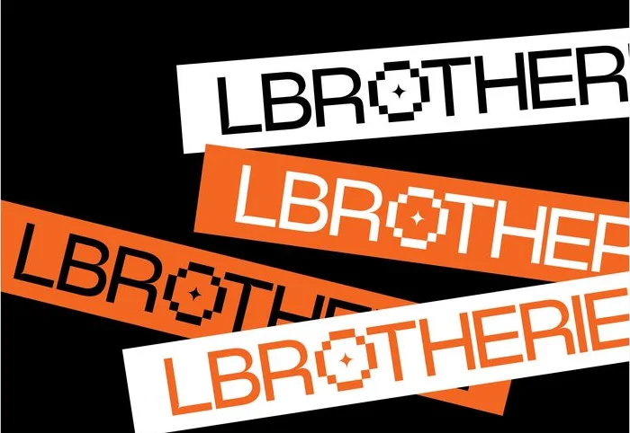 Lbrotherie stickers in white and orange, tilted