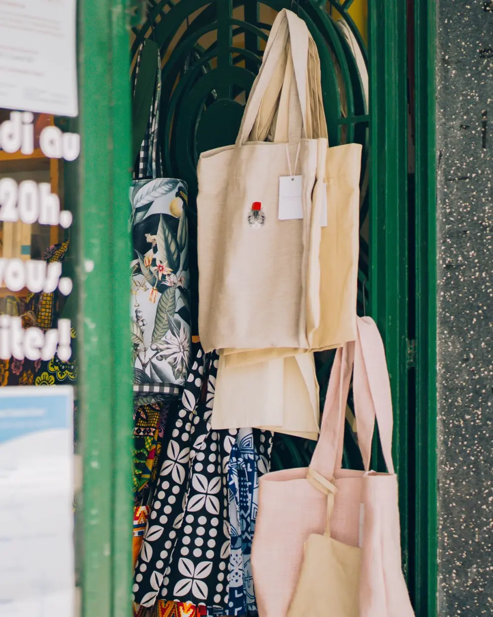 Tote bags hanging at the bookshop’s door