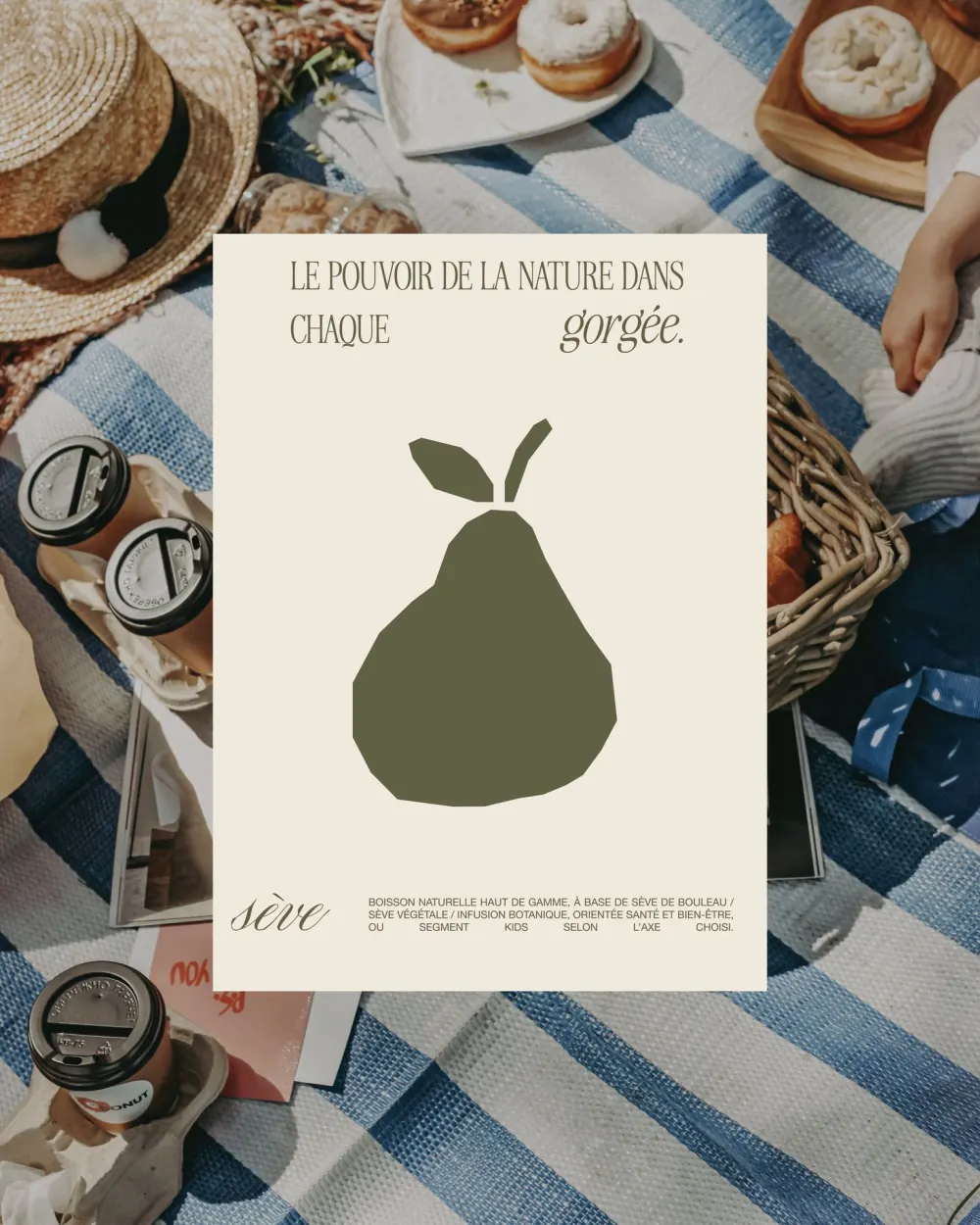 Sève poster with a green pear on a picnic blanket