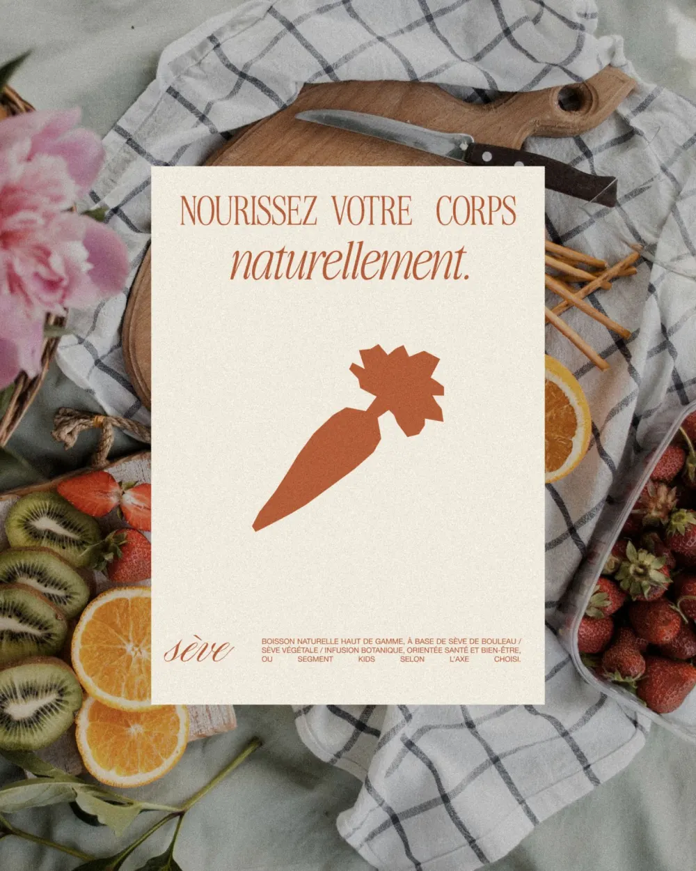 Poster with an orange carrot on a picnic with fruit