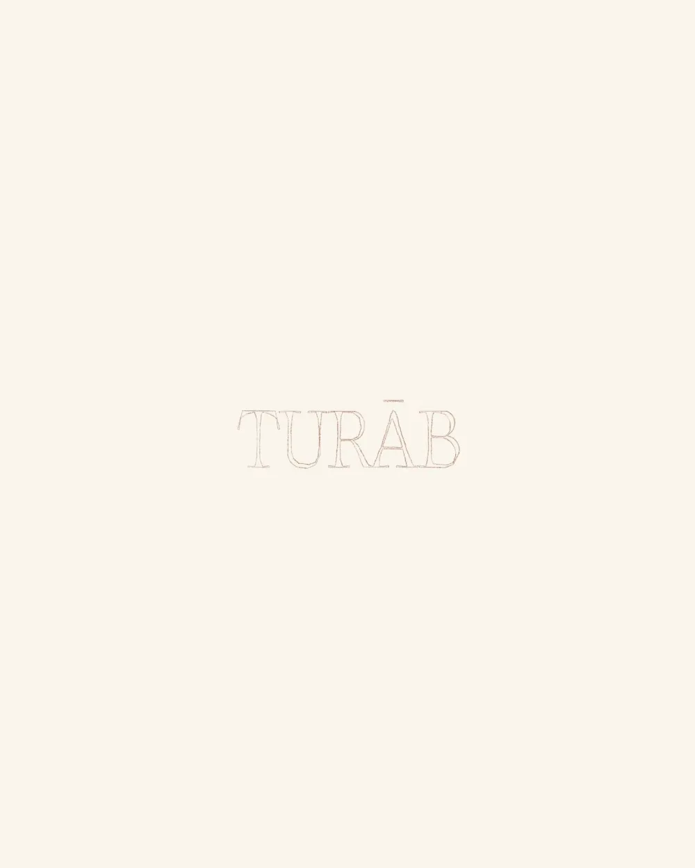 Turāb wordmark blind-embossed on ivory paper
